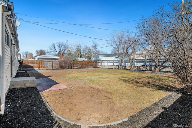 view of yard featuring a fenced backyard