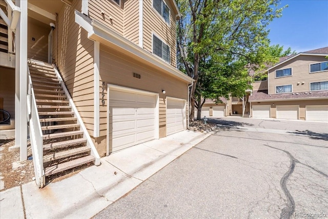 garage with driveway