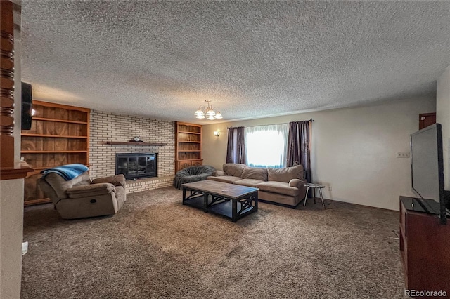 carpeted living room with a textured ceiling, a chandelier, and a fireplace