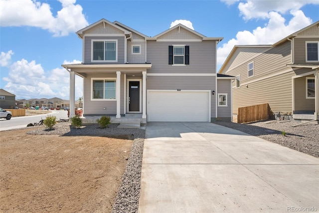 18126 Coppermallow Trl, Parker, CO 80134 - craftsman house featuring driveway, an attached garage, and a porch
