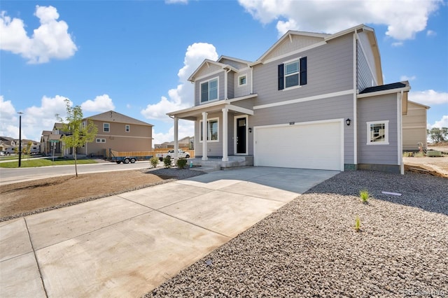 18126 Coppermallow Trl, Parker, CO 80134 - view of front of home with covered porch, concrete driveway, an attached garage, and a residential view