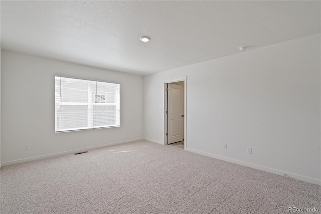 18126 Coppermallow Trl, Parker, CO 80134 - unfurnished room with light colored carpet and a smoke detector