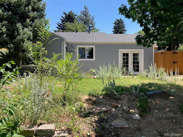 5350 Primrose Ln, Denver, CO 80221 - view of side of home with a shingled roof