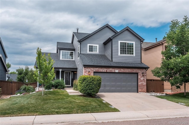 9758 Red Oakes Dr, Highlands Ranch, CO 80126 - view of front facade featuring concrete driveway, roof with shingles, a garage, and brick siding