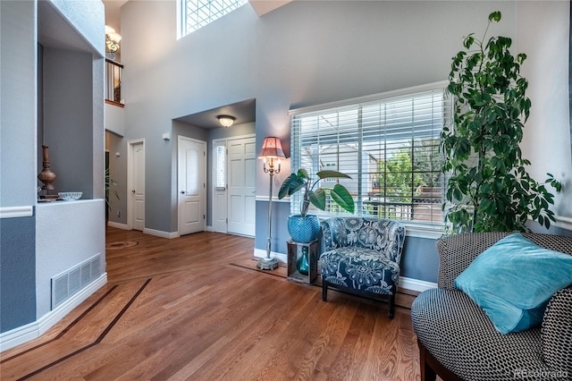 9758 Red Oakes Dr, Highlands Ranch, CO 80126 - entryway with wood finished floors and a towering ceiling