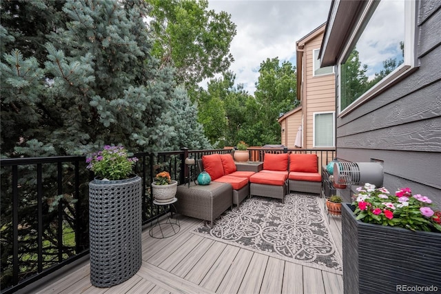 9758 Red Oakes Dr, Highlands Ranch, CO 80126 - wooden deck with an outdoor living space
