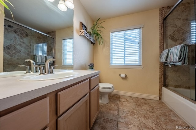 9758 Red Oakes Dr, Highlands Ranch, CO 80126 - bathroom with vanity and bath / shower combo with glass door