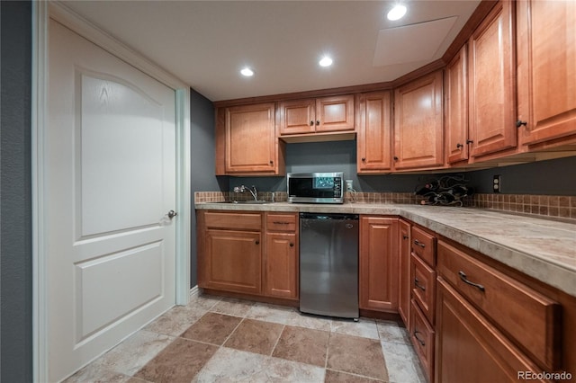 9758 Red Oakes Dr, Highlands Ranch, CO 80126 - kitchen with appliances with stainless steel finishes, light stone finish flooring, recessed lighting, and brown cabinets