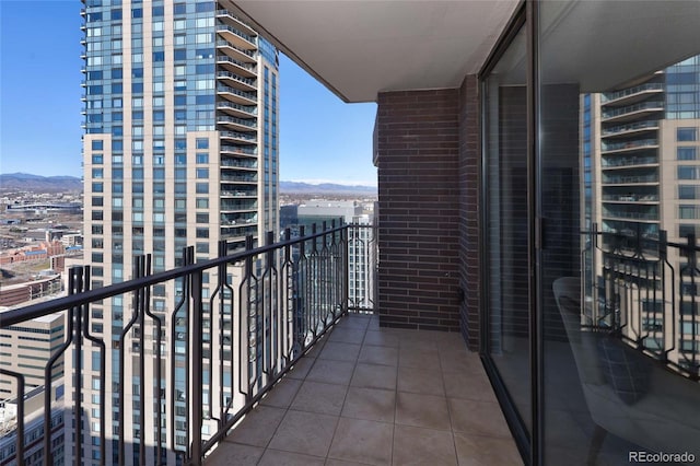 balcony featuring a mountain view