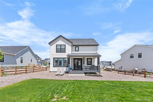 1168 Elbridge Dr, Elizabeth, CO 80107 - back of property featuring covered porch and roof with shingles