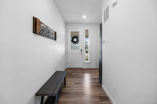1168 Elbridge Dr, Elizabeth, CO 80107 - doorway to outside featuring baseboards, dark wood-style flooring, and recessed lighting