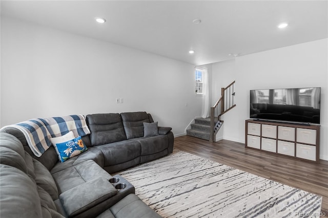 1168 Elbridge Dr, Elizabeth, CO 80107 - living room featuring wood finished floors, stairs, recessed lighting, and baseboards