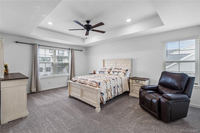 1168 Elbridge Dr, Elizabeth, CO 80107 - bedroom with a tray ceiling, carpet floors, recessed lighting, baseboards, and a ceiling fan