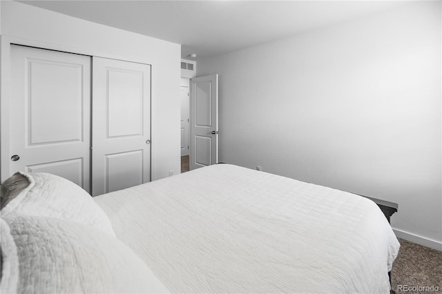 1168 Elbridge Dr, Elizabeth, CO 80107 - bedroom featuring baseboards, carpet floors, and a closet