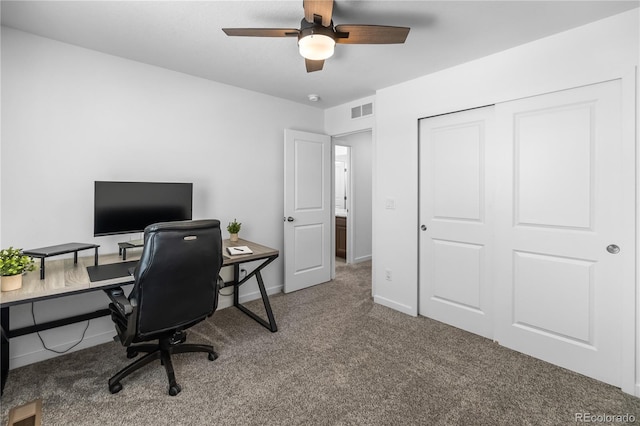 1168 Elbridge Dr, Elizabeth, CO 80107 - home office with a ceiling fan, carpet floors, and baseboards
