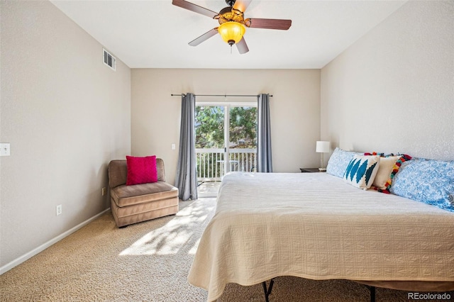 bedroom featuring a ceiling fan, baseboards, visible vents, access to outside, and carpet flooring