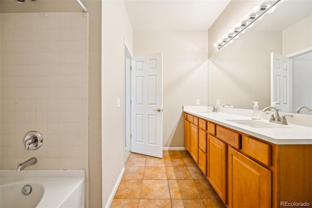 full bath with a sink, tub / shower combination, double vanity, and tile patterned flooring