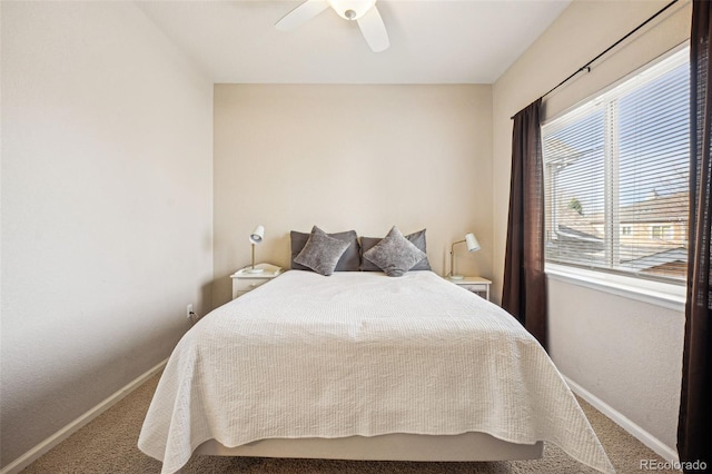 bedroom featuring carpet flooring, ceiling fan, and baseboards