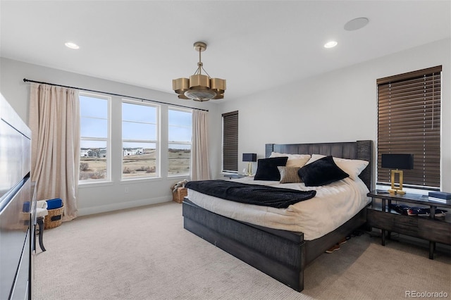 7077 Copper Sky Cir, Castle Pines, CO 80108 - bedroom with a chandelier, carpet floors, recessed lighting, and baseboards