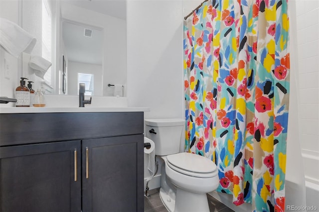 7077 Copper Sky Cir, Castle Pines, CO 80108 - bathroom featuring vanity, toilet, tile patterned flooring, and shower / tub combo with curtain
