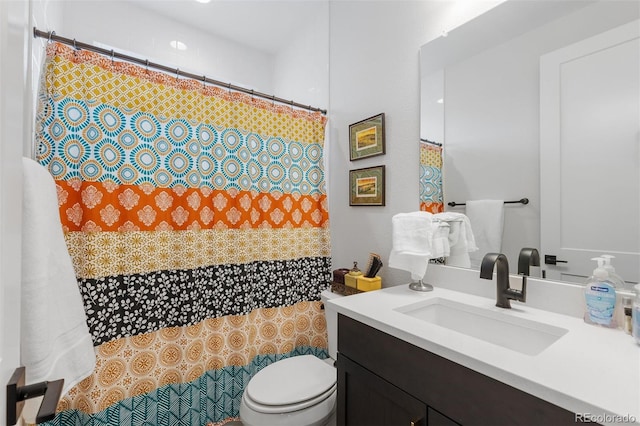 7077 Copper Sky Cir, Castle Pines, CO 80108 - bathroom featuring toilet, vanity, and a shower with shower curtain