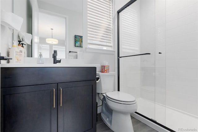 7077 Copper Sky Cir, Castle Pines, CO 80108 - bathroom with a stall shower, vanity, toilet, and tile patterned flooring