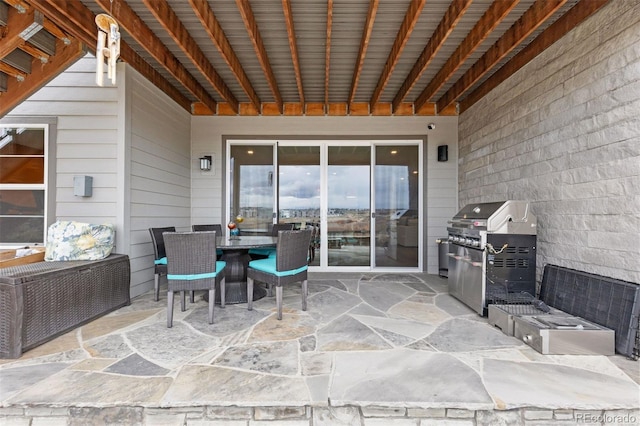 7077 Copper Sky Cir, Castle Pines, CO 80108 - view of patio with outdoor dining area and area for grilling