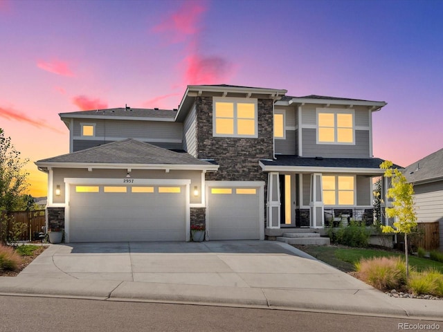 view of front of property with a garage