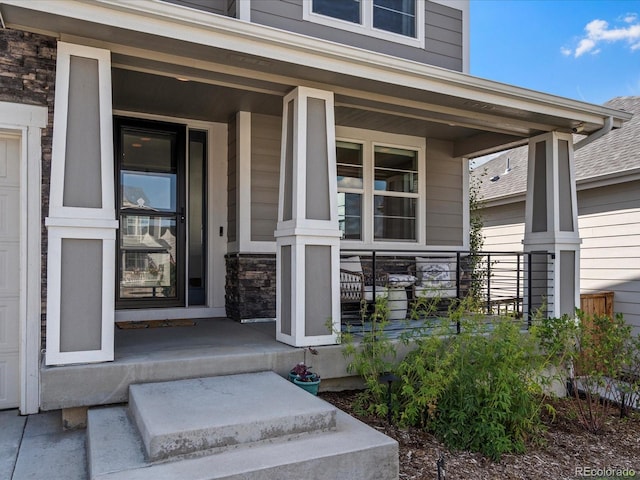 property entrance with covered porch