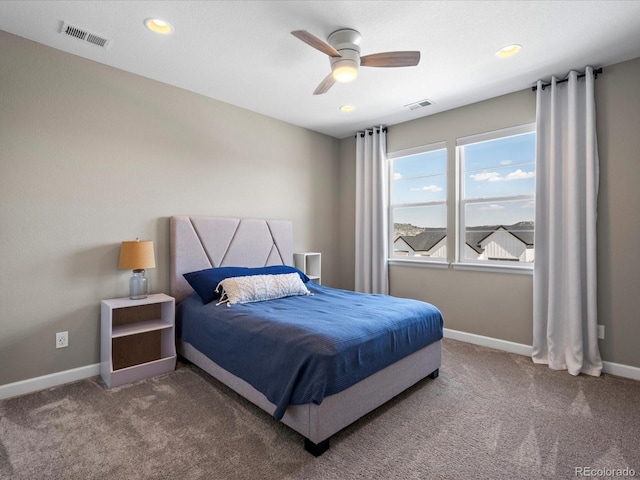 carpeted bedroom with ceiling fan