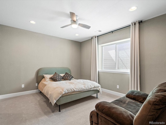 carpeted bedroom featuring ceiling fan