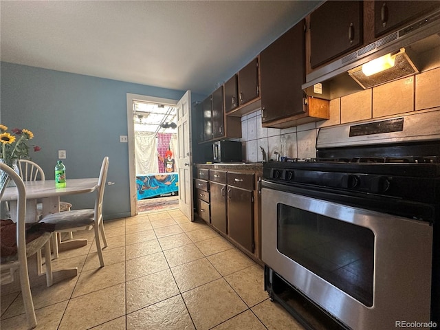 260 Sheridan Blvd, Denver, CO 80226 - kitchen with stainless steel gas range, backsplash, under cabinet range hood, and dark brown cabinets