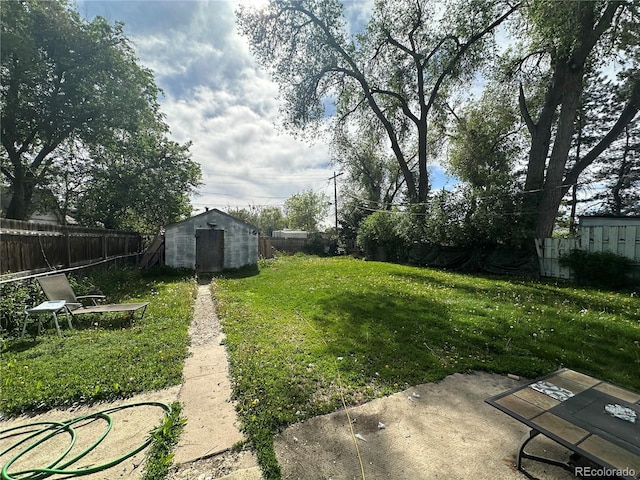 260 Sheridan Blvd, Denver, CO 80226 - view of yard featuring a shed and an outbuilding