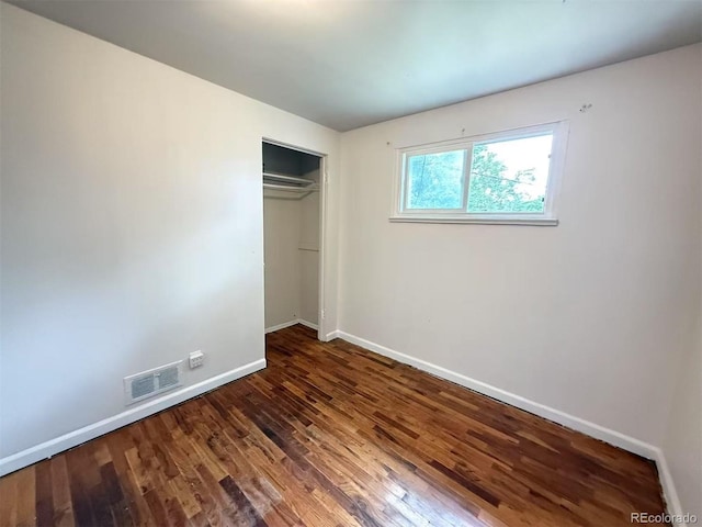 260 Sheridan Blvd, Denver, CO 80226 - unfurnished bedroom featuring wood finished floors and a closet