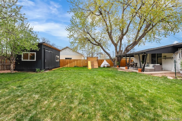 3103 W Bellewood Dr, Englewood, CO 80110 - view of yard with an outdoor hangout area, an outdoor structure, a storage shed, and a patio area