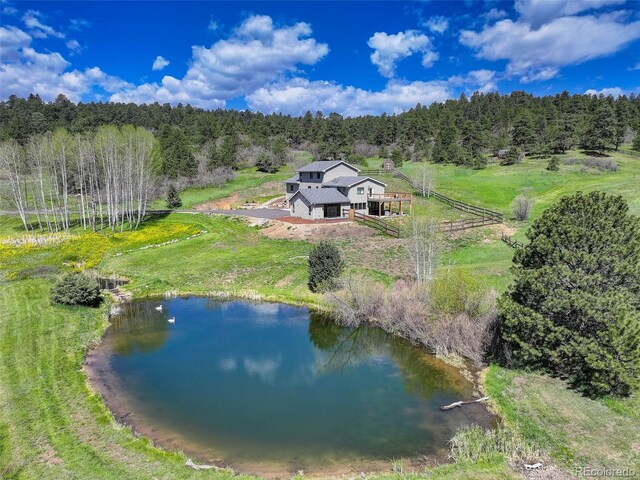20101 Spring Gulch Rd, Morrison, CO 80465 - view of subject property featuring a heavily wooded area and a nearby body of water
