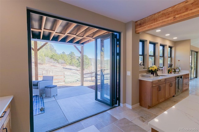 20101 Spring Gulch Rd, Morrison, CO 80465 - doorway with wine cooler and recessed lighting