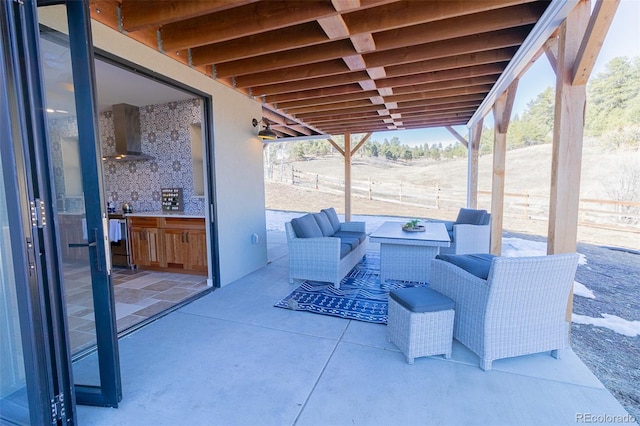 20101 Spring Gulch Rd, Morrison, CO 80465 - fenced backyard featuring a patio area and an outdoor kitchen