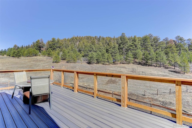 20101 Spring Gulch Rd, Morrison, CO 80465 - wooden deck featuring a wooded view