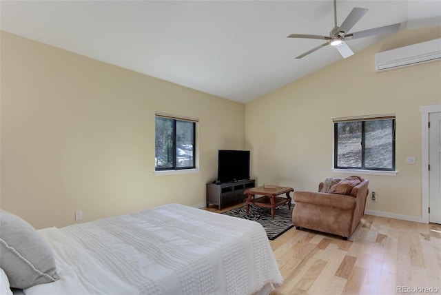 20101 Spring Gulch Rd, Morrison, CO 80465 - bedroom with a wall unit AC, light wood-style flooring, baseboards, high vaulted ceiling, and a ceiling fan