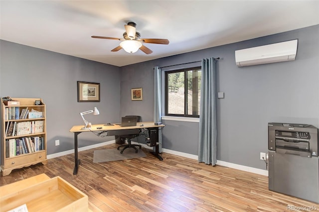 20101 Spring Gulch Rd, Morrison, CO 80465 - office with an AC wall unit, ceiling fan, light wood-style flooring, and baseboards