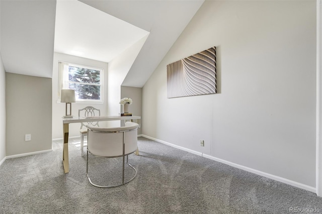 office with carpet flooring, baseboards, and vaulted ceiling