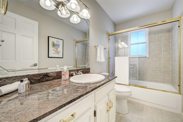 full bathroom featuring a chandelier, toilet, vanity, bath / shower combo with glass door, and tile patterned floors