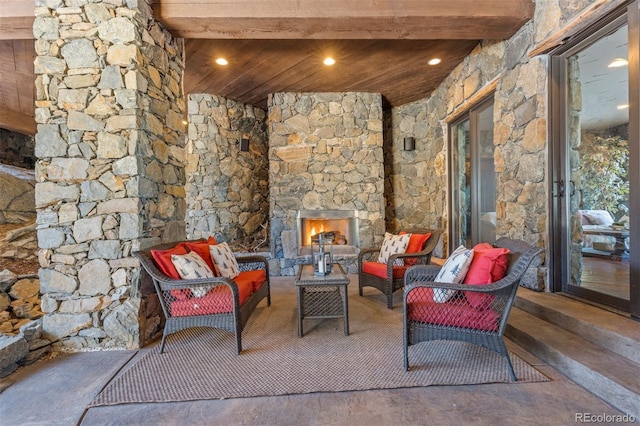 view of patio / terrace featuring an outdoor living space with a fireplace