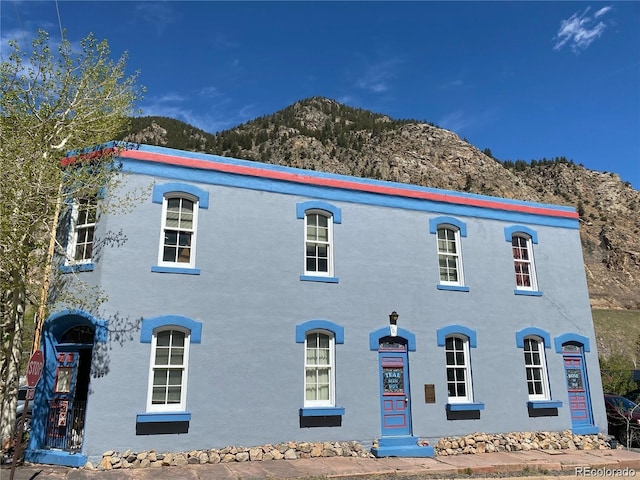 401 Rose St, Georgetown, CO 80444 - view of front facade with a mountain view and stucco siding