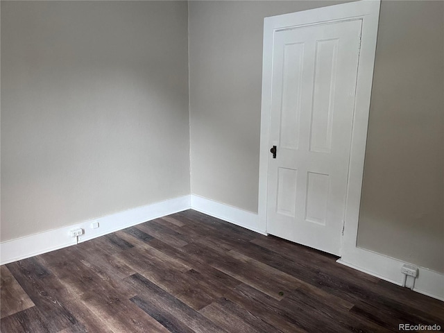 401 Rose St, Georgetown, CO 80444 - spare room with dark wood finished floors and baseboards