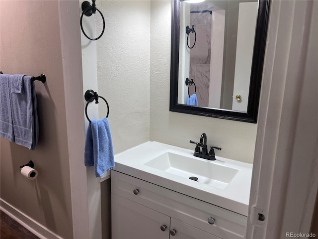 401 Rose St, Georgetown, CO 80444 - bathroom featuring vanity and a textured wall