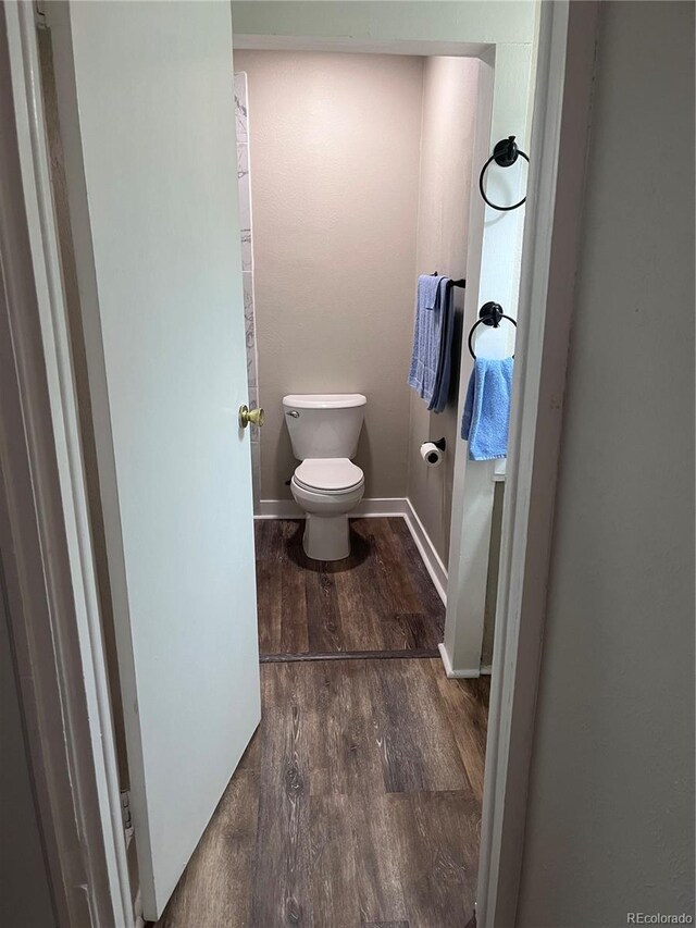 401 Rose St, Georgetown, CO 80444 - bathroom with toilet and wood finished floors