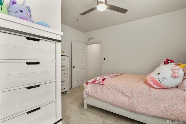 bedroom featuring visible vents, carpet, and a ceiling fan