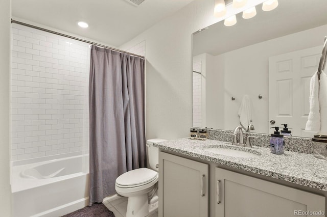 bathroom with tile patterned floors, shower / bathtub combination with curtain, toilet, and vanity